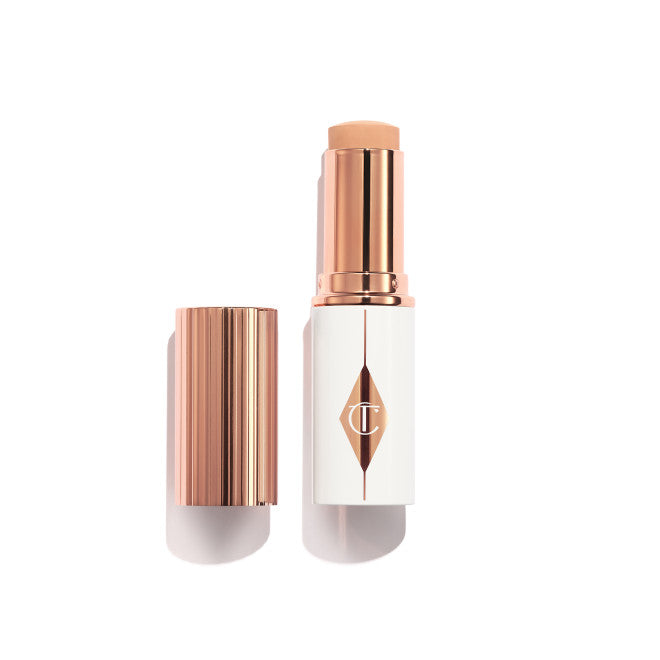 UNREAL SKIN SHEER GLOW TINT HYDRATING FOUNDATION STICK - Charlotte Tilbury tropchic