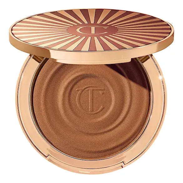 Charlotte Tilbury beautiful skin sun-kissed glow tropchic